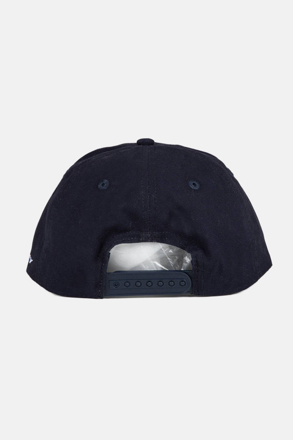 Back view of the Rusty Pipeline Dad Cap featuring adjustable snap closure.