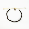 Pineapple Island Coconut Beach Bracelet with dark wood beads and adjustable cord.