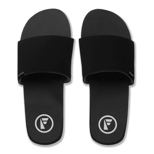 Top view of FoamLife Tarlan Slide black men's slider with logo detail.