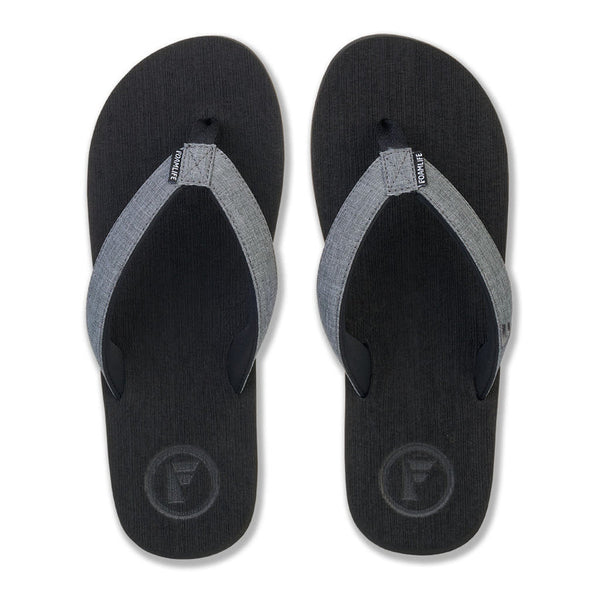 Top view of FoamLife Sharp men's black flip flops with stylish strap detail.