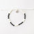 Stylish Pineapple Island Anklet FIA-024 with black and white beads.