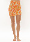 Sisstrevolution Sunshine Swim Knit Skirt in coral with vibrant swirl pattern, front view.