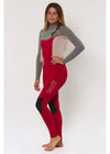 Sisstrevolution 7 Seas 3/2 chest full wetsuit in red with gray sleeves, side view.