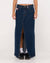 Rusty Celeste low-rise denim maxi skirt with front slit, styled casually.