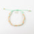 Pineapple Island Bracelet RCB-034 with braided pastel design and charm.