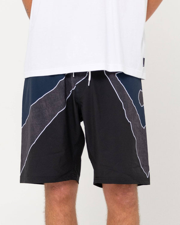 Rusty Illusion Boardshort with geometric design, back view.