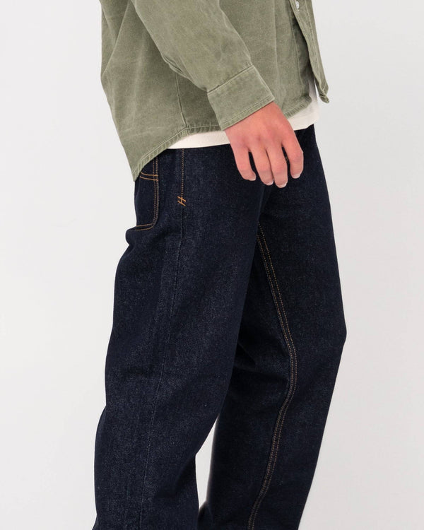 Close-up of Rusty Steven Straight Fit Jean with visible stitching and pocket detail.