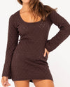Close-up of Rusty Leo long sleeve knit mini dress in brown showcasing textured details.