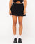 Front view of Rusty Sicily Mid Rise Mini Skirt in black.
