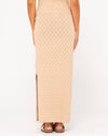 Back view of Rusty Leo Maxi Knit Skirt featuring diamond pattern and side slit.