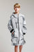 White Water Kids Soft Shell Robe in Arctic Camo, front view on boy.