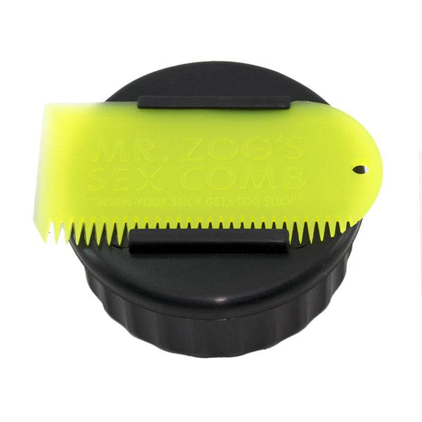 Black Sexwax wax container with yellow comb for surfboard waxing.