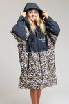 White Water kids hard shell robe with hood up, leopard print design.