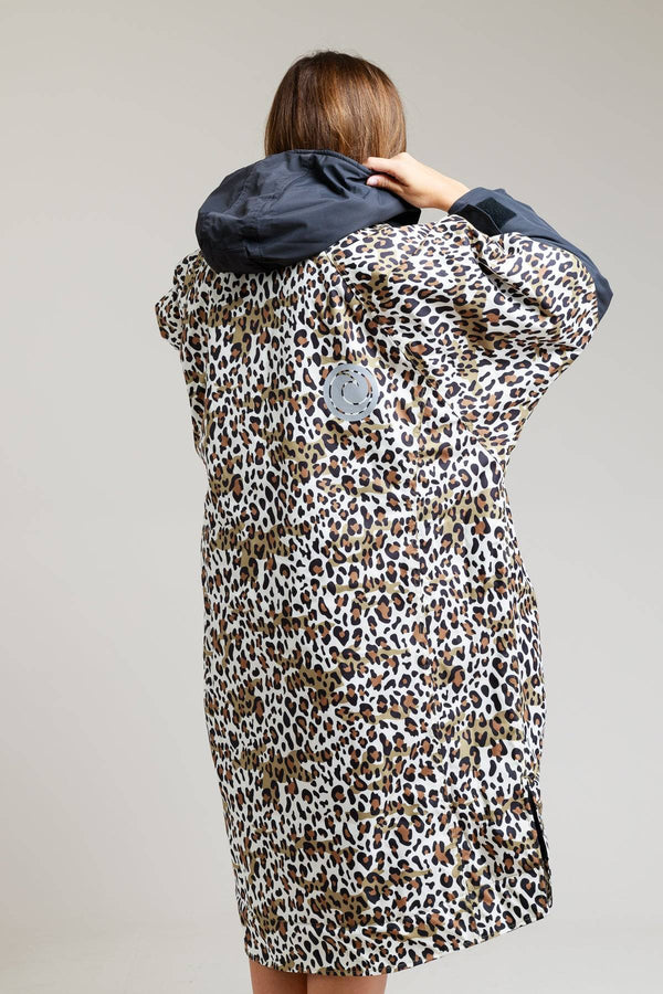 Back view of leopard print White Water robe with black hood and ventilation detail.