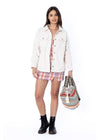 Sisstr Michelle Eco-Zy Shirt styled with a plaid dress and boots, front view.