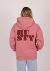 Back view of Rusty Alana oversize pink zip hooded fleece with bold logo.