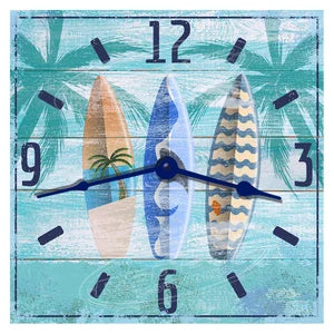 Beach-themed clock with surfboard designs and palm tree background.