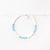 Stylish Pineapple Island bracelet FIM-021 with white and blue beads.