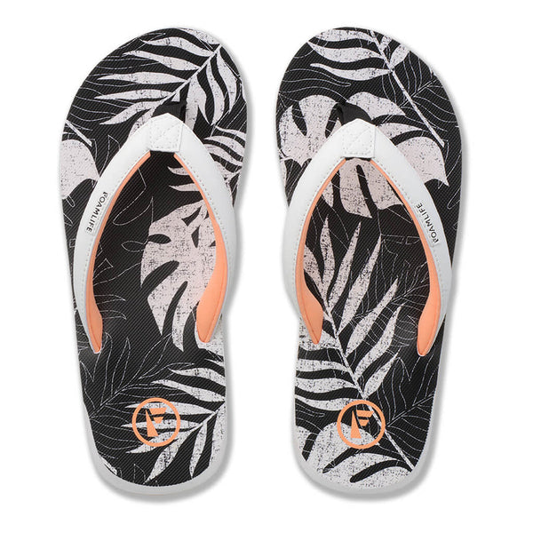 Top view of FoamLife Zikat SC women's black flip flops with leaf pattern.