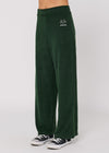 Side view of Sisstrevolution Sofia Pant in North Green, featuring a relaxed fit.