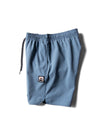 Vissla Solid Sets 17.5" Ecolastic boardshort in tidal blue, folded side view.