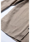 Detailed view of Vissla Shaper Eco Flannel in dark sand, highlighting fabric texture and hem.