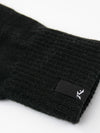 Detailed view of Rusty Hold Up Gloves with a focus on the black logo tag.