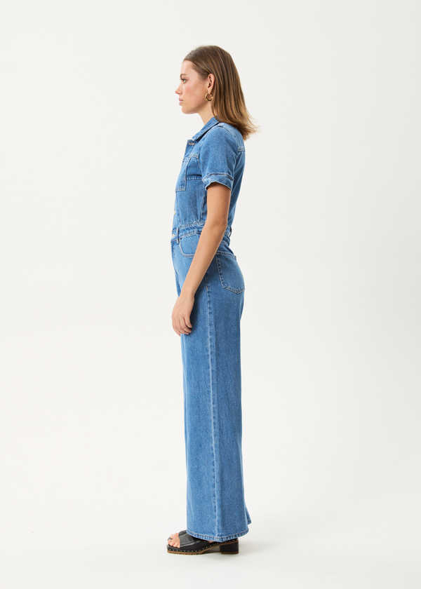 Afends Miami- Denim Flared Jumpsuit - worn blue