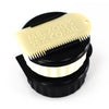 Black Sexwax wax container with white comb for surfboard maintenance.