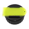 Black Sexwax wax container with yellow comb for surfboard waxing.