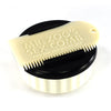 Black Sexwax wax container with cream comb for surfboard upkeep.