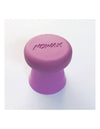 Purple NoWax ergonomic surfboard wax remover with a double-edged design for efficient wax removal.