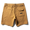 Vissla Solid Sets 18.5" boardshort in gold coral, back view with pocket.