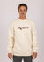 Rusty Ninety Mile Crewneck Fleece in cream with front logo design.