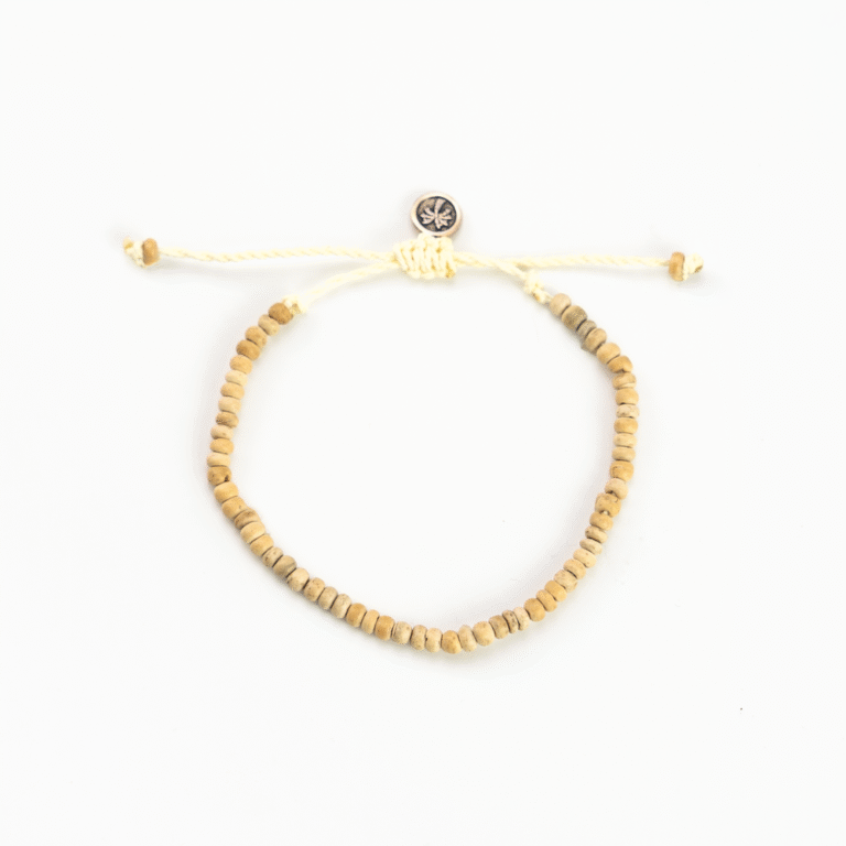 Coconut wood bead bracelet with adjustable cord and button clasp.