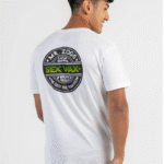 Back view of the Sexwax Word Fade Tee in green, featuring bold logo design.